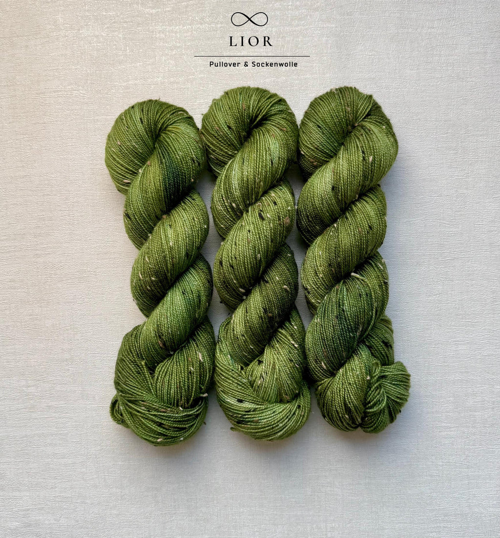 Handgefärbte Wolle Merino Donegal 100g.