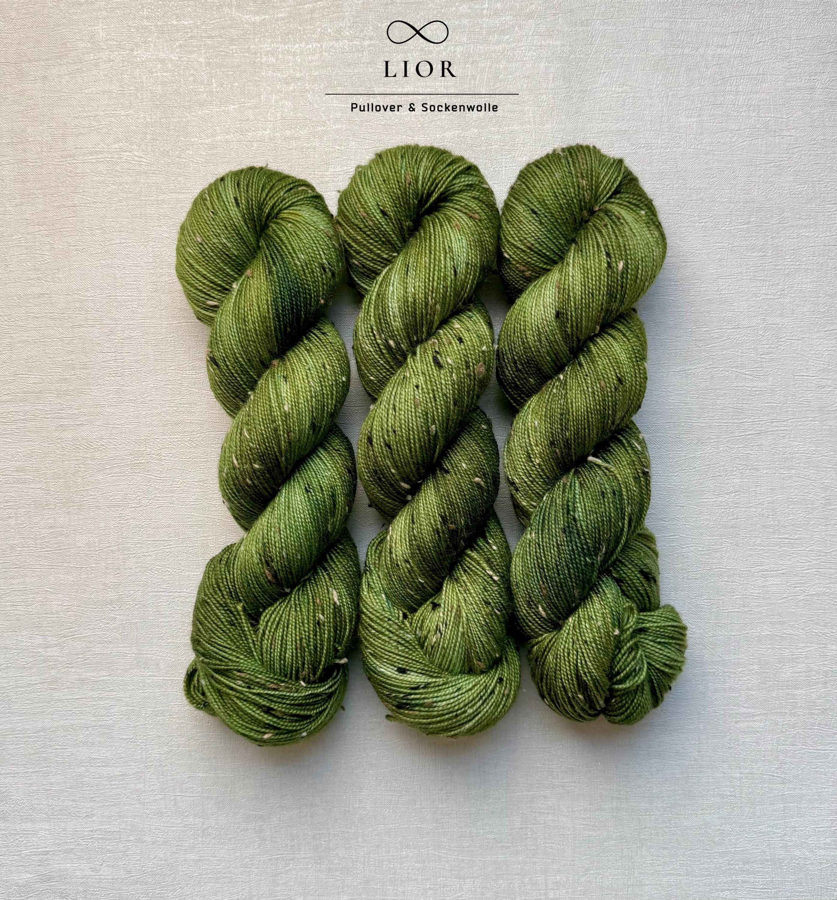 Handgefärbte Wolle Merino Donegal 100g.